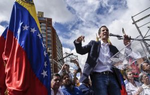 “We are confident that we can achieve a peaceful transition and free elections,” Guaidó told CNN