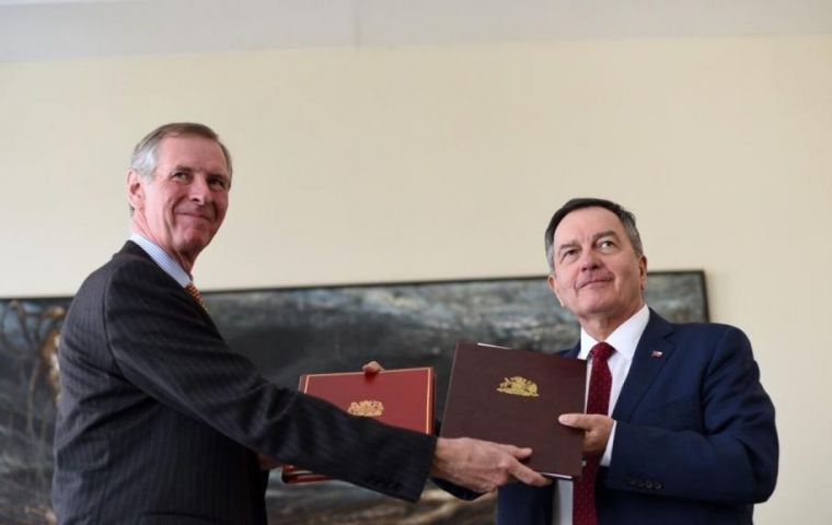 Ambassador to Chile Jamie Bowden and Chilean Foreign Minister Roberto Ampuero stamped the agreement 