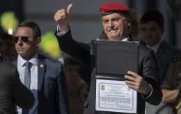 Bolsonaro canceled a visit to New York where he was to be honored as person of the year by the Brazilian-American Chamber of Commerce, after criticism of his past