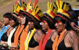 Brazilian indigenous women march in Brasilia to demand that the government protect the Amazon rainforest (AFP)