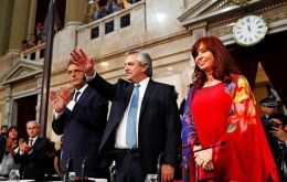 President Fernandez next to his mentor Cristina Kirchner and the head of the Lower House, Sergio Massa, addressing Congress