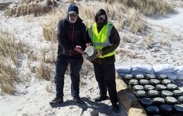 Guy Marot of Fenix Insight and John Hare of SafeLane Global holding the last mine removed from the ground and which will be detonated this Saturday in a special celebration (Pics G. Marot)
