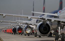 LATAM aircraft lined up at Santiago's main airport. REUTERS/Ivan Alvarado