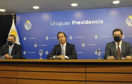 President Luis Lacalle Pou, next to his two Executive branch secretaries explains the latest package of measures 