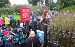 Hundreds of Trump supporters broke through the gates of the Washington governor's mansion complex in Olympia late Wednesday, flooding the lawn