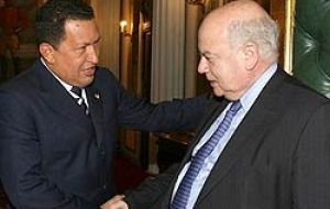 President Hugo Chavez and OAS Secretary Jose Insulza