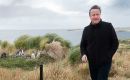 Lord Cameron visits Gypsy Cove on the Falkland Islands last month, where he saw Magellanic Penguins (Pic PA)