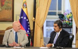 Khan (left) announced plans for his team to return to Venezuela in approximately three weeks to collaborate with local experts.