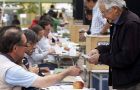 Chilean voters depositing their ballots, but an even greater number did not attend