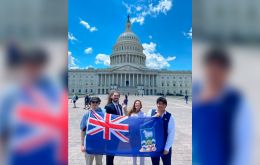 Members of the delegation with a Falklands flag in front of the US Congress in Washington