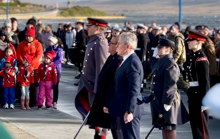 Laying wreaths at the Liberation Monument next to MLA Pete Biggs