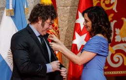“Argentina and Spain have a lot in common,” Ayuso told Milei when pinning the medal on his lapel