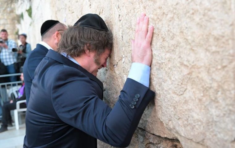 President Milei with his close friend/mentor and ambassador in Israel, Axel Wahnish during a visit to the Whaling Wall in Jerusalem .  