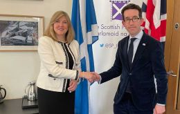 Falklands Government Representative in London, Richard Hyslop congratulates  the presiding officer of the Scottish Parliament, Alison Johnstone, MSP