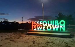 A patriotic sign in Guyana advertises the region of Essequibo as the country's own [Nazima Raghubir/Al Jazeera]