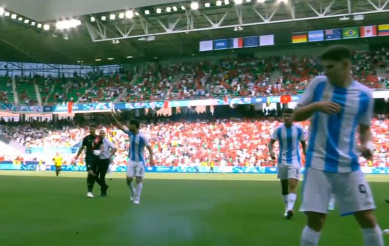 Moroccan fans threw firecrackers at Argentina's bench forcing a 2-hour interruption after which Medina's goal was overturned