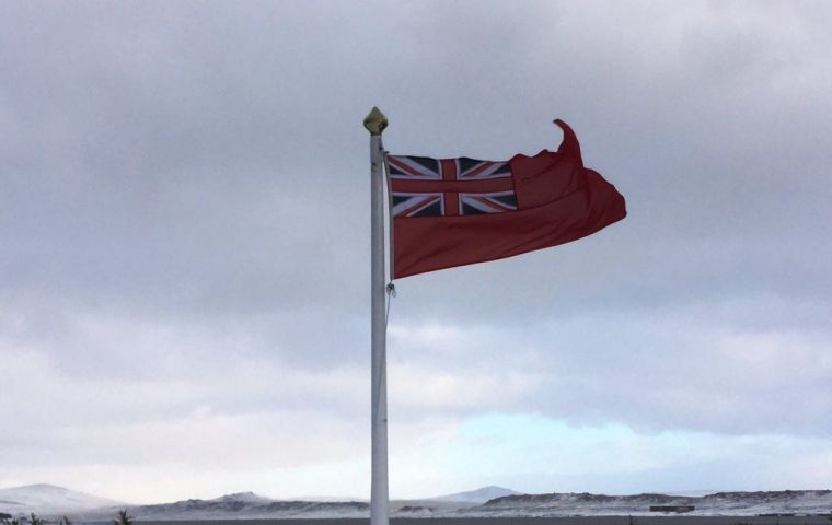 The Red Ensign flying in windy Falkland Islands 