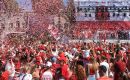 On a warm sunny day, Gibraltarians in traditional Rock colors of red and white assembled at noon for some short political addresses and to sing the National Anthem