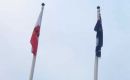 The flags of the Falklands and Gibraltar flying at Victory Green in Stanley