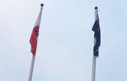 The flags of the Falklands and Gibraltar flying at Victory Green in Stanley