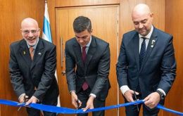 From left to right: Magen, Peña, and Ohana cut the traditional ribbon during Wednesday's ceremony