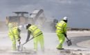 Workers completing resurfacing on the Alpha Loop taxiway at Mount Pleasant Complex earlier this year. MOD Crown Copyright – Cpl Laura Wing.