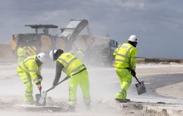 Workers completing resurfacing on the Alpha Loop taxiway at Mount Pleasant Complex earlier this year. MOD Crown Copyright – Cpl Laura Wing.