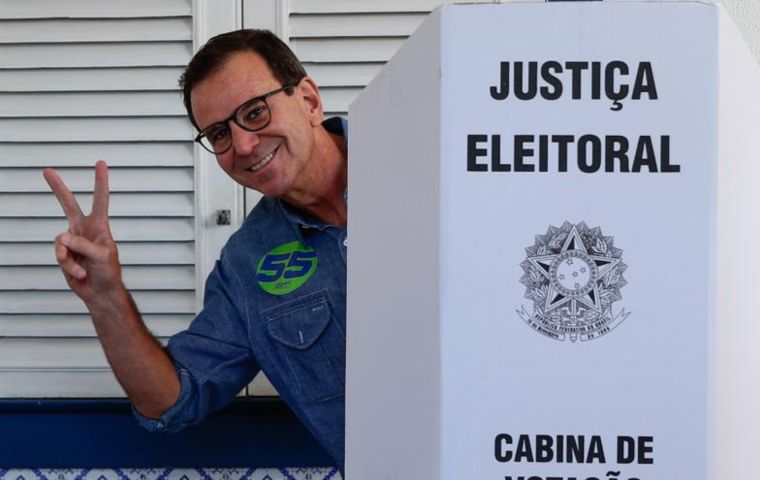 Paes was reelected Sunday but Sao Paulo will have to wait until the Oct. 27 runoff