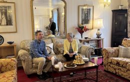 Ambassador Navai enjoying tea at Government House with Governor Blake