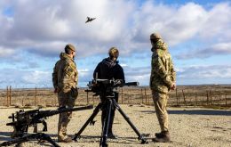 Watching a Typhoon fighter next to infantry defenses (Pic BFSAI)