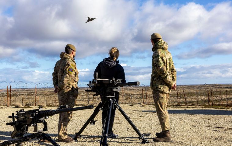 Watching a Typhoon fighter next to infantry defenses (Pic BFSAI)