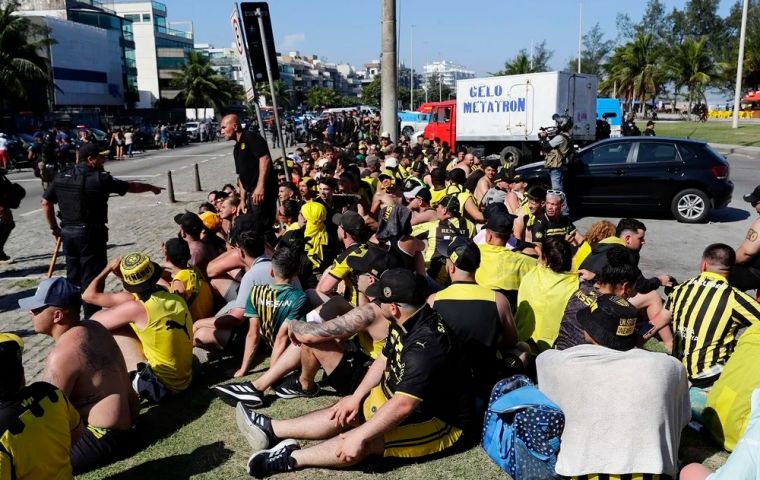 “We were defending ourselves from an attack,” a Peñarol fan said about the clash with supporters of Rio teams Botafogo, Flamengo, and Fluminense 