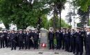 Chilean navy personnel and HMS Protector crew members at the Colonel battle memorial 