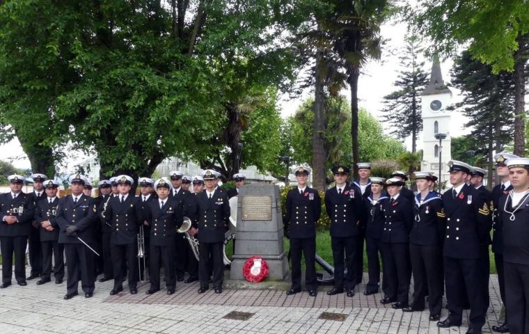 Chilean navy personnel and HMS Protector crew members at the Colonel battle memorial 