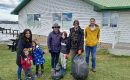 Some of the children with the cleanup bags