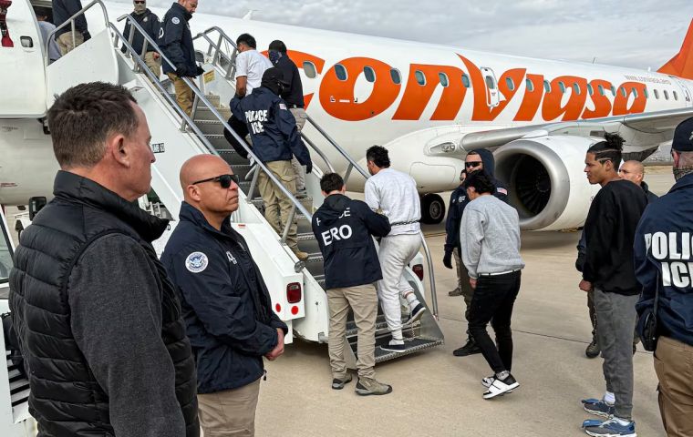 Venezuelan deportees are loaded onto a plane, in an image shared by the White House, February 10, 2025.