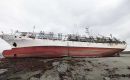 Korean flagged jigger 107 Eun Hae remains grounded on a sandbank off Settlement Cove, Saunders Island