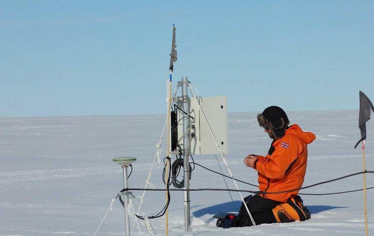Oliver Marsh downloading GPS data.