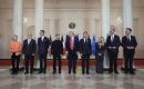 This time around, Zelensky at least wore a dark suit, albeit no tie