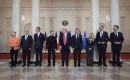 This time around, Zelensky at least wore a dark suit, albeit no tie