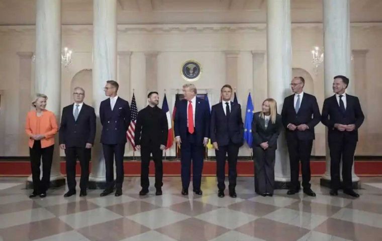 This time around, Zelensky at least wore a dark suit, albeit no tie