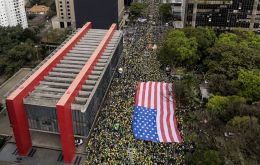 The protesters also waved US flags, thanking Trump for siding with Bolsonaro