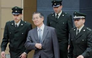 Fujimori says he will make no attempt to flee Chile pending the outcome of his extradition case