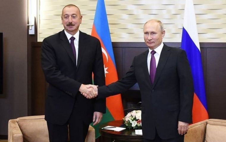 Putin (R) made the announcement during a meeting with Aliyev in Tajikistan