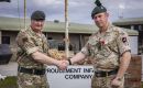 The Rifles (2 RIFLES) left, greets the head of B Company, 1st Battalion, Royal Irish Regiment, right. 