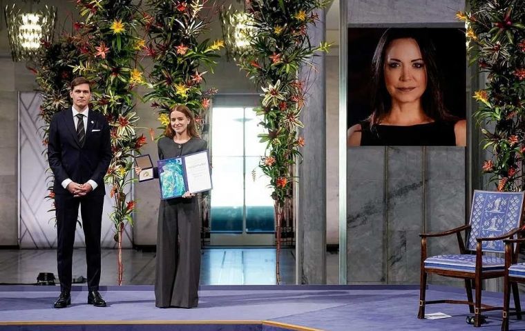 Through her daughter, Machado dedicated her accolade “to the anonymous heroes of the resistance”