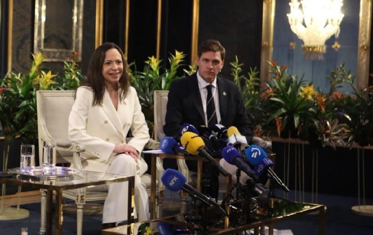 Machado pledged to take her accolade ”to Venezuela at the appropriate time”