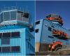 Operations tower and team outside the new Discovery Building at Rothera Research Station, featuring solar panels on the fa&ccedil;ade. Credit: Pete Bucktrout and David Ganiford, BAS.