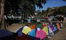 Outside El Rodeo I prison near Caracas, families set up tents and mattresses to keep watch and share basic supplies
