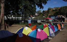 Outside El Rodeo I prison near Caracas, families set up tents and mattresses to keep watch and share basic supplies